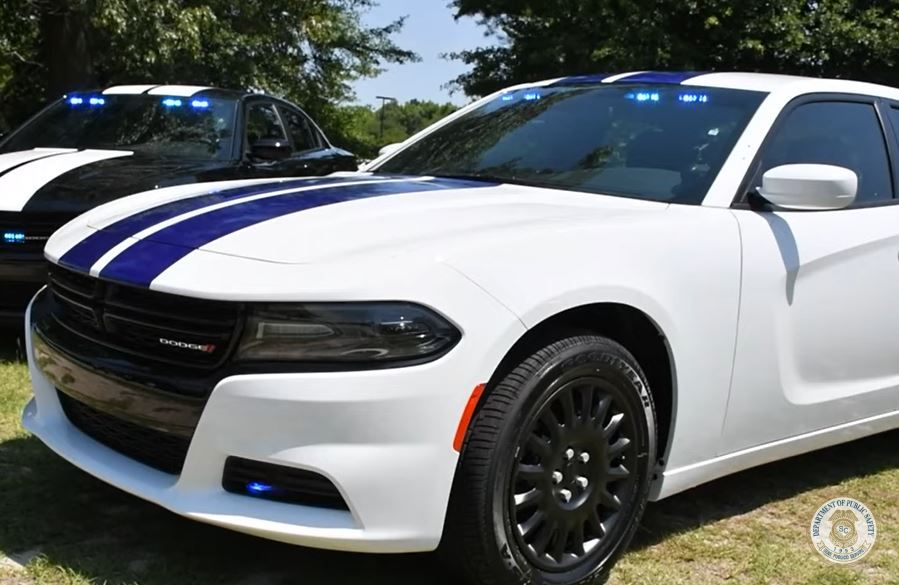 How unmarked police cars improve traffic enforcement